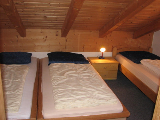 Schlafzimmer : mit 3 Betten